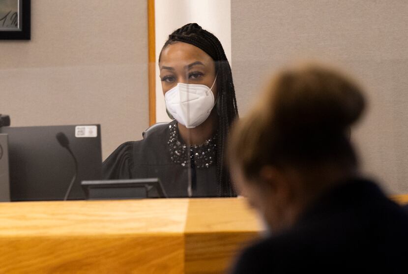 State District Judge Amber Givens listens during a hearing inside the 282nd District Court...