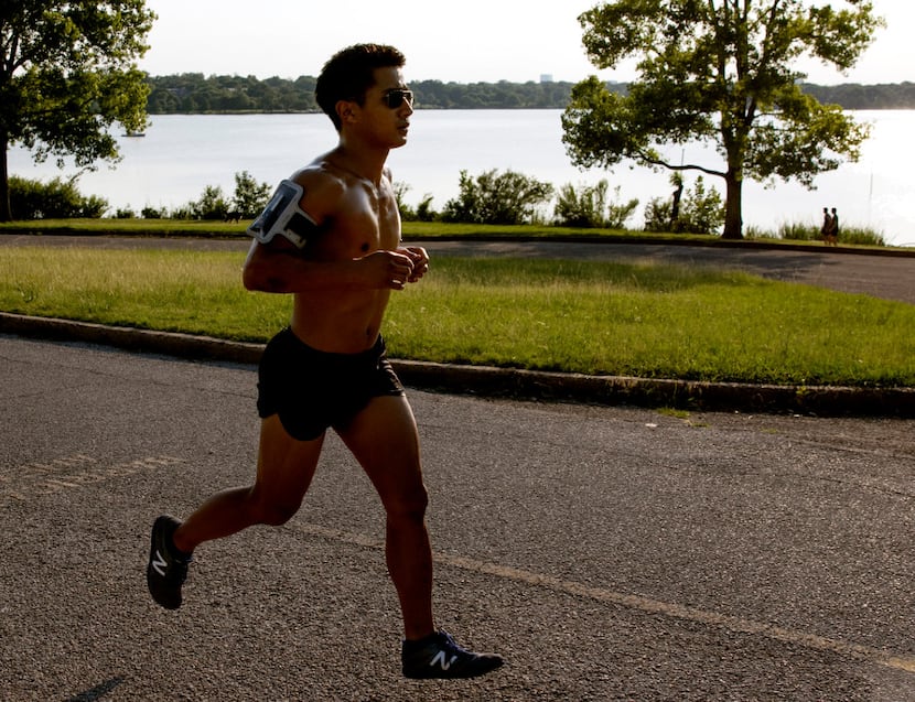 White Rock Lake provides a scenic backdrop for runners who join the White Rock Running Co-op...