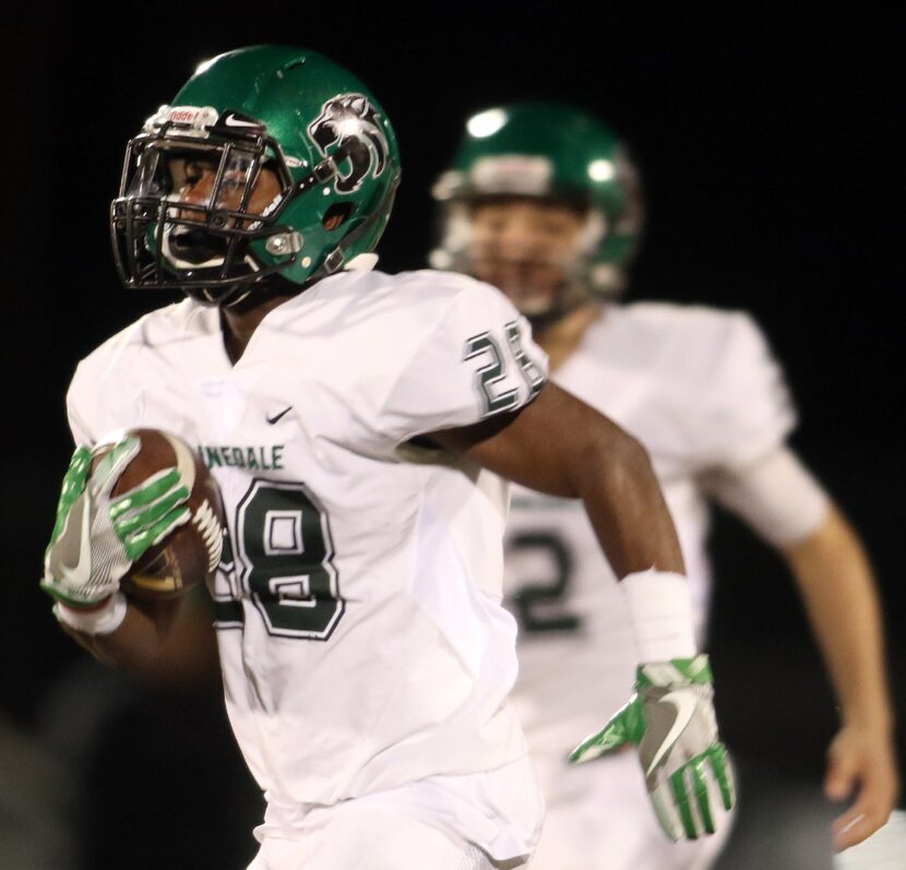 Kennedale running back DJ Kirven (28) is "off to the races" as he rambles for a 67-yard...