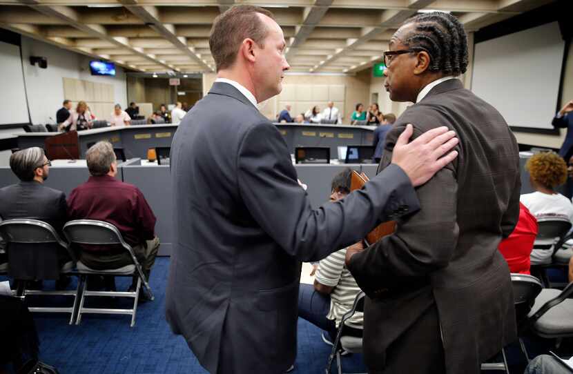 Dallas City Council member Philip Kingston chats with Dallas County Commissioner John Wiley...