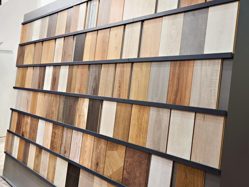 Wall of laminate floor samples in different colors