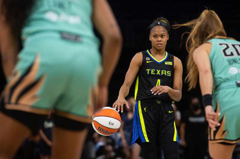 Dallas Wings guard Moriah Jefferson (4) looks for the next play during their game against...