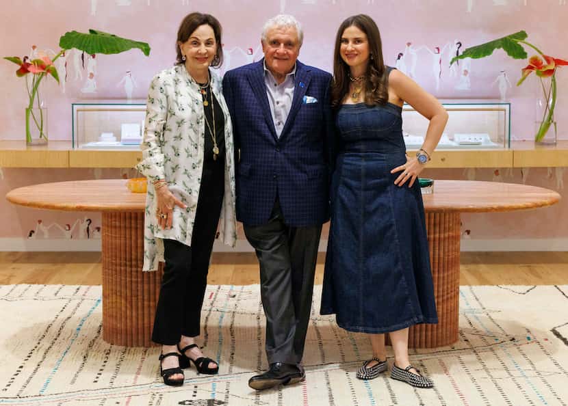 Joanne and Charles Teichman stand with their daughter Alysa Teichman inside Ylang 23,...
