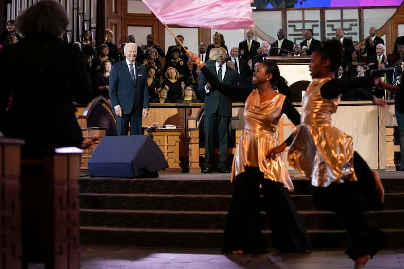 President Joe Biden and Sen. Raphael Warnock, D-Ga., attend a Sunday service honoring Martin...