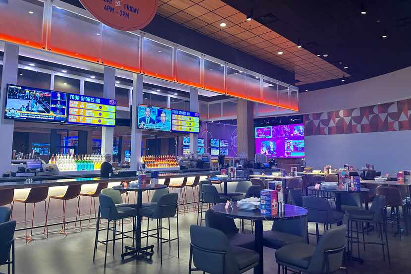 The remodeled Dave & Buster's in Dallas features a larger dining area and expanded menu.