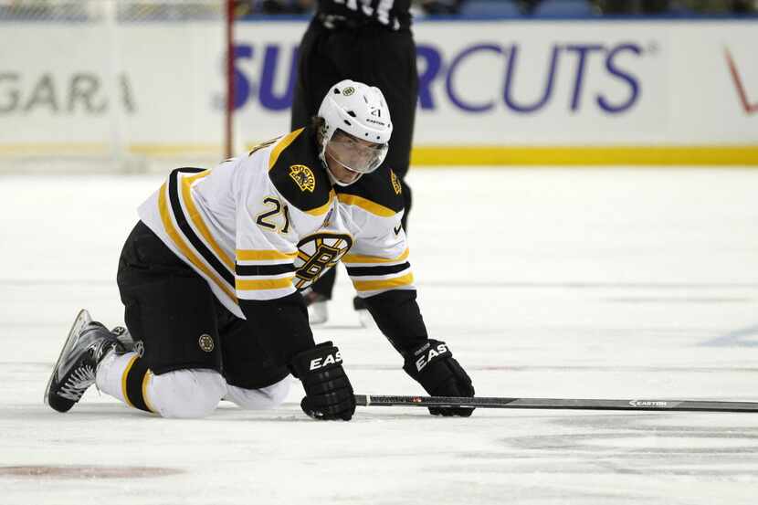 Oct 23, 2013; Buffalo, NY, USA; Boston Bruins left wing Loui Eriksson (21) on the ice after...