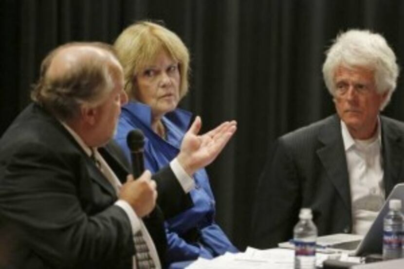  Regional Transportation Director Michael Morris, far left, speaks during a 2014 debate on...