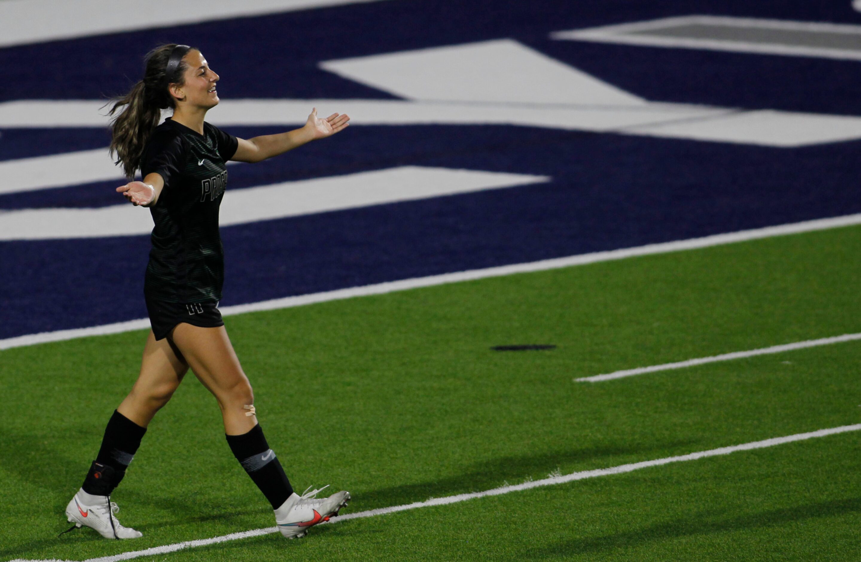 Prosper freshman midfielder Emma Yolinsky (11) questions the lack of a penalty call after a...