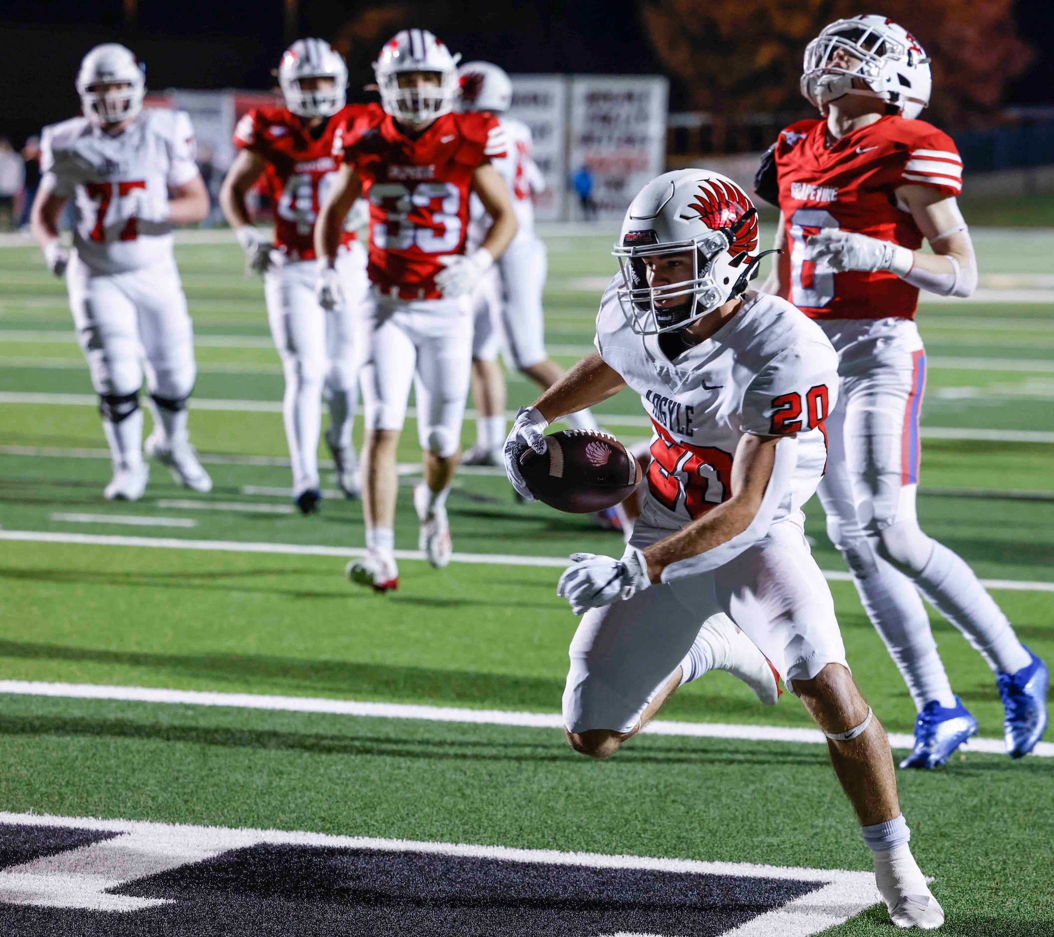 Argyle High’s Landon Farris (20) completes a touchdown during the first half of a football...