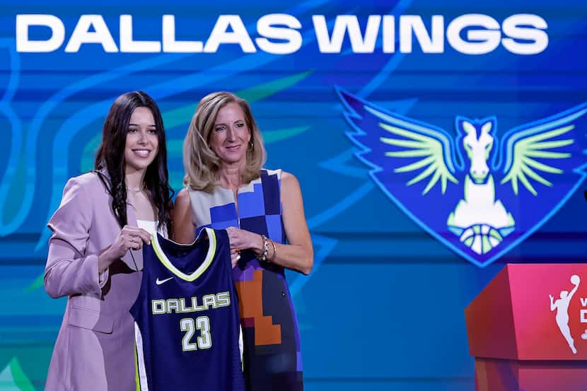 Connecticut's Lou Lopez Sénéchal (left) posed with Commissioner Cathy Engelbert after being...