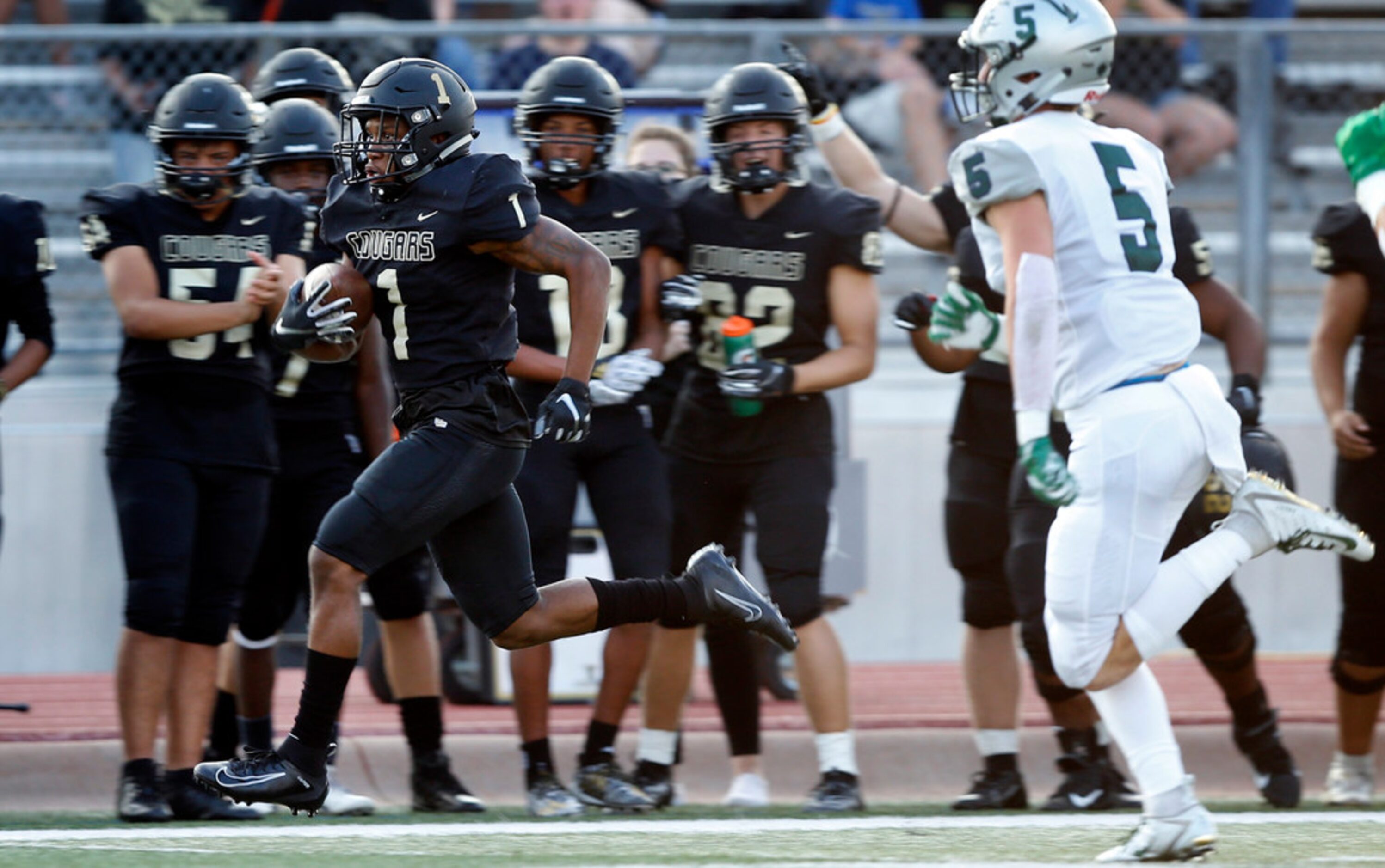 The Colony wide receiver Myles Price (1) races down the sideline for a long first quarter...