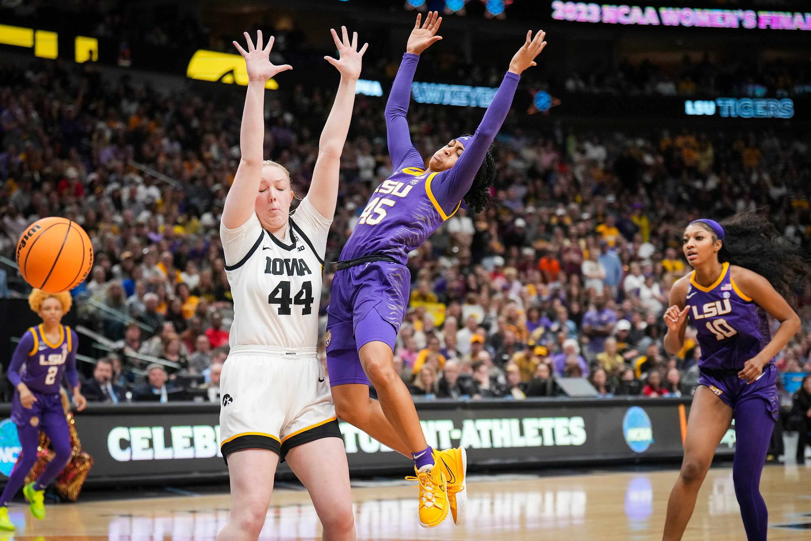 LSU guard Alexis Morris (45) is fouled by Iowa forward Addison O'Grady (44) during the...