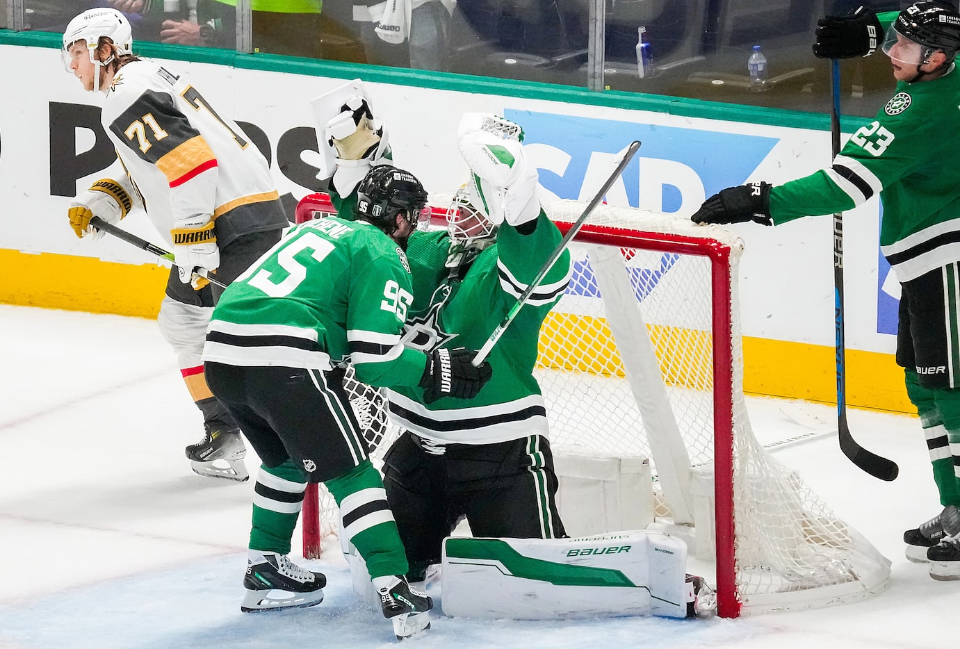 Dallas Stars goaltender Jake Oettinger (29) celebrates with center Matt Duchene (95) time...