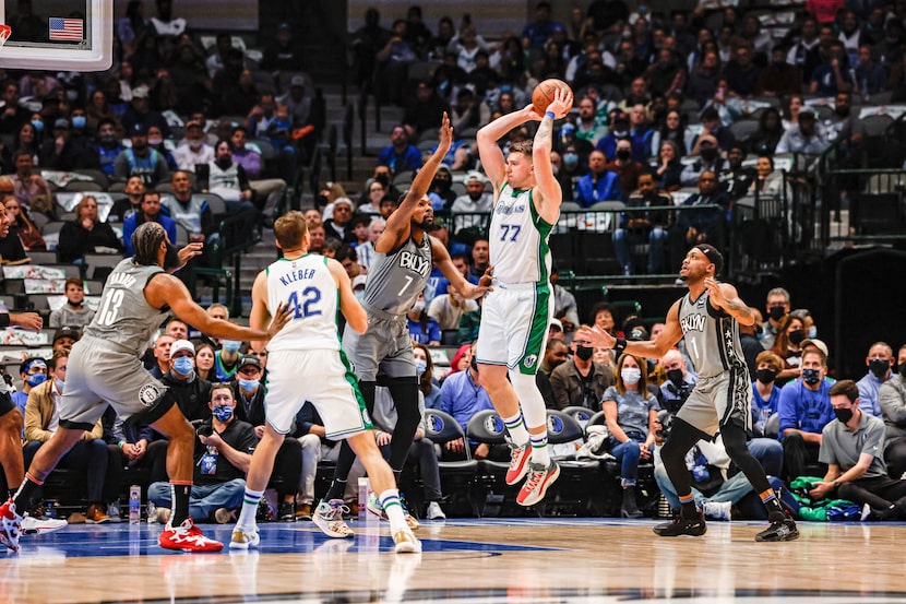 Dallas Mavericks guard Luka Doncic (77) goes for a shot against the Brooklyn Nets during the...