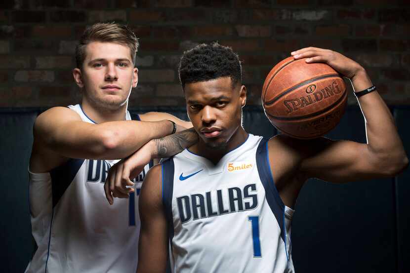 Dallas Mavericks Luka Doncic (left) and Dennis Smith Jr. pose for a photo during Dallas...