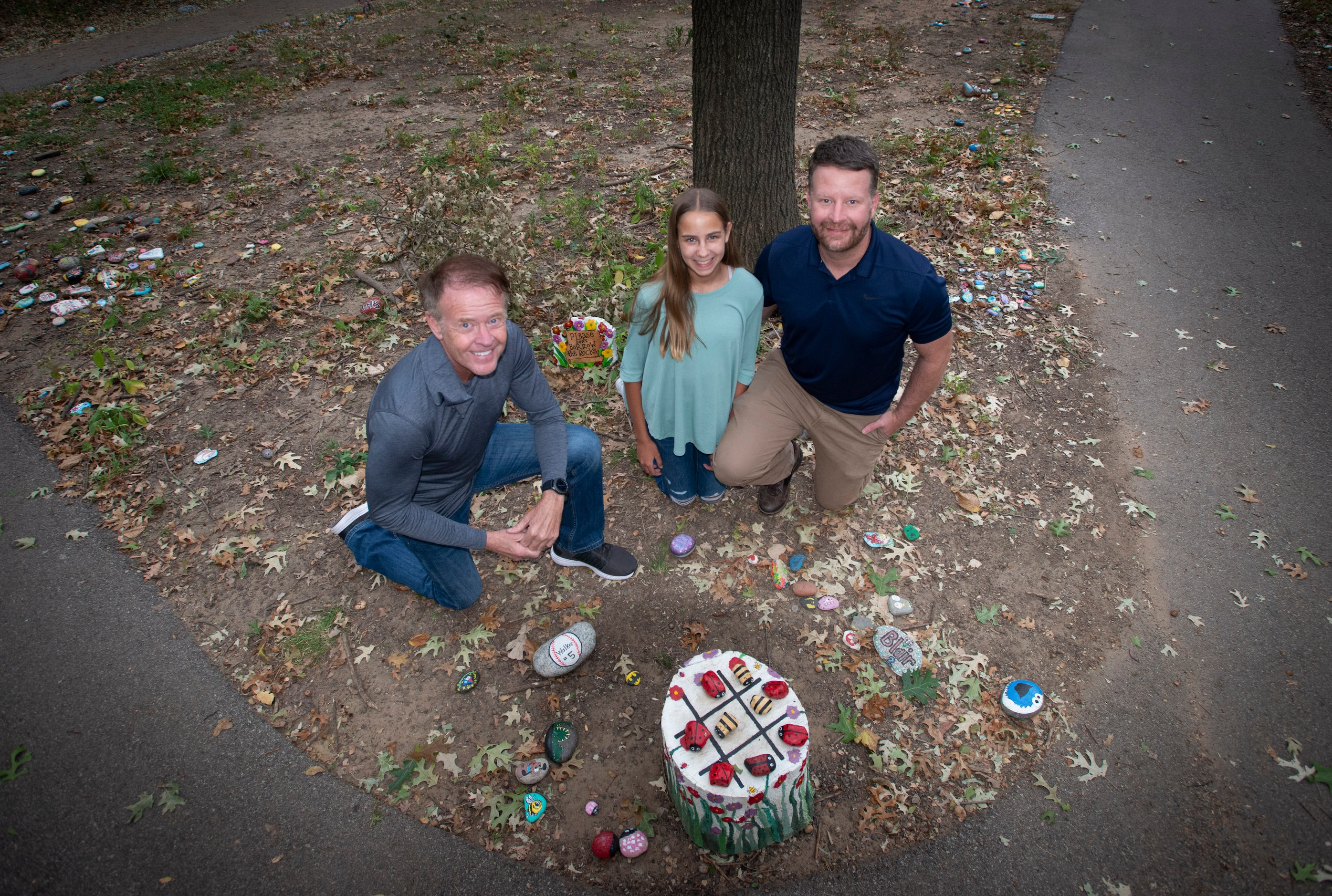 Ron Olsen, left, Sophia Penny (one of the first artists to contributer a rock) and her...