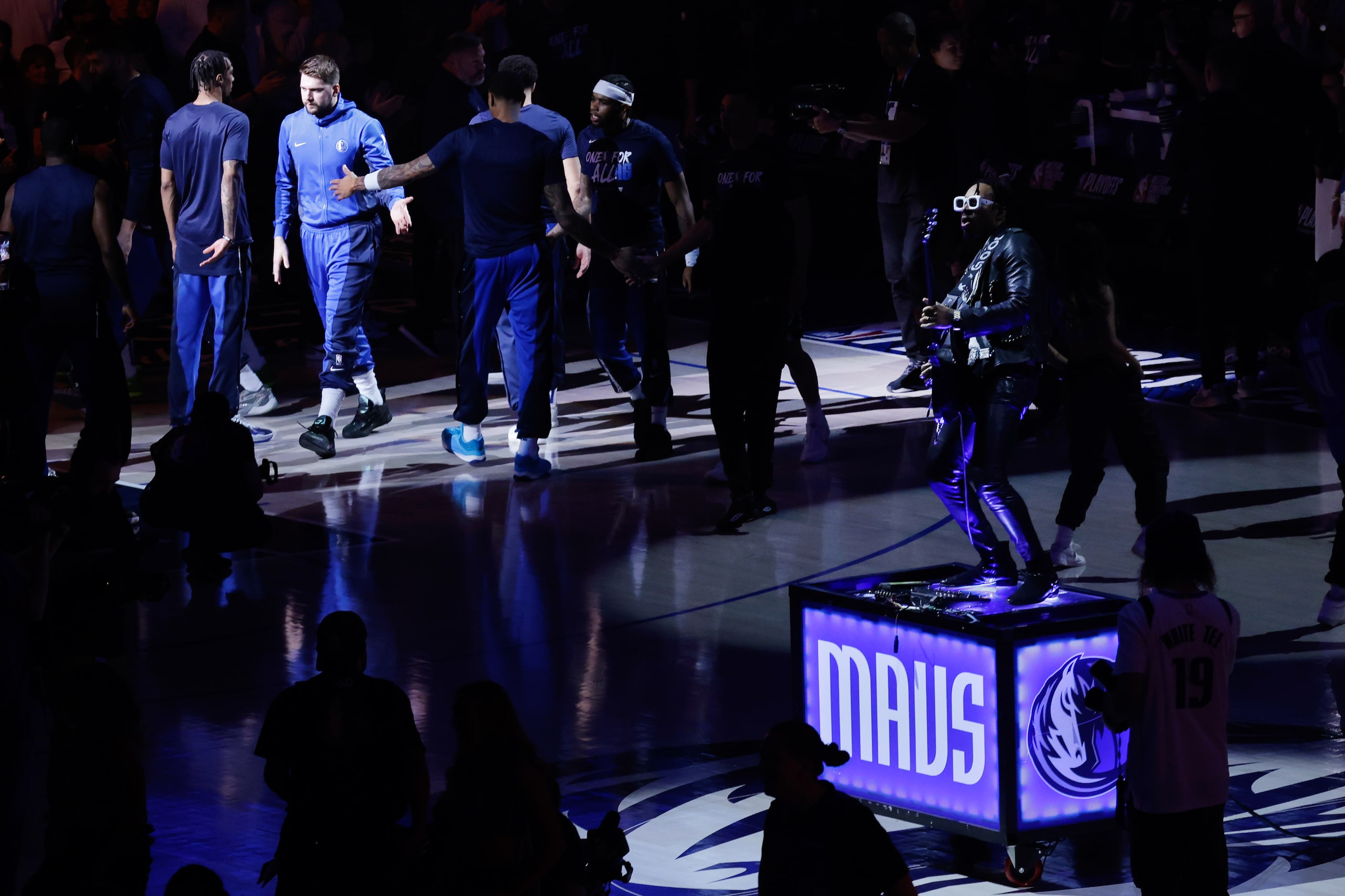 Dallas Mavericks guard Luka Doncic (77) is introduced as 'GuitarSlayer' Justin Lyons...