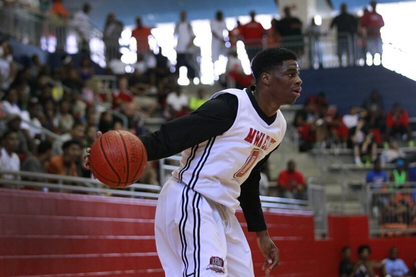 Mo Williams Academy AAU basketball player Emmanuel Mudiay (0) looks to drive against Dallas...
