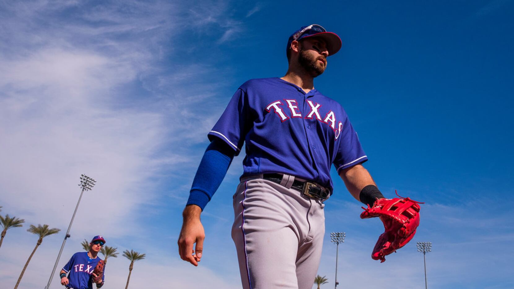 Texas Rangers outfielder Joey Gallo heads for the dugout during the fifth inning of a spring...