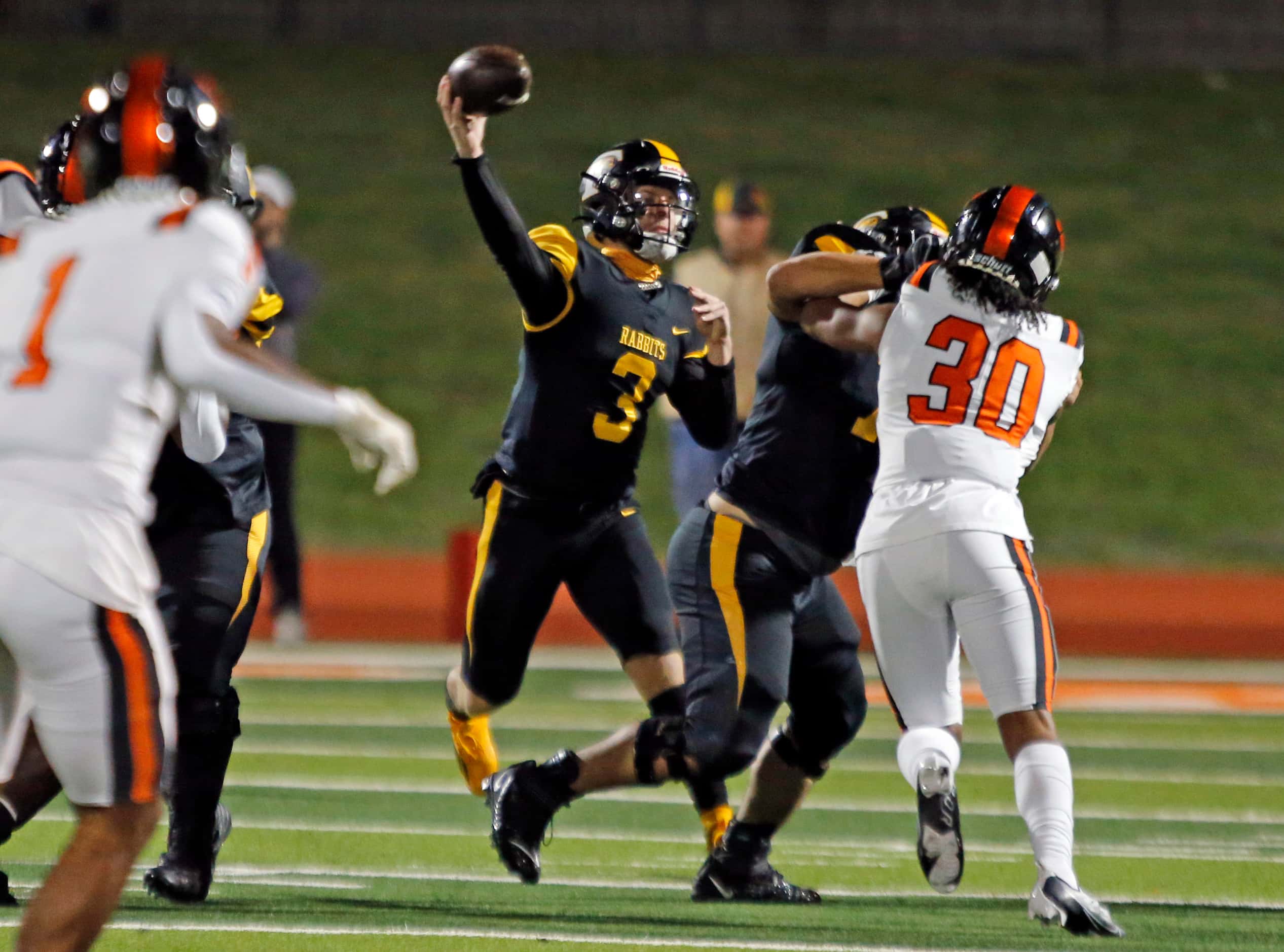 Forney high QB Kyle Crawford (3) throws a pass during the first half of a high school...
