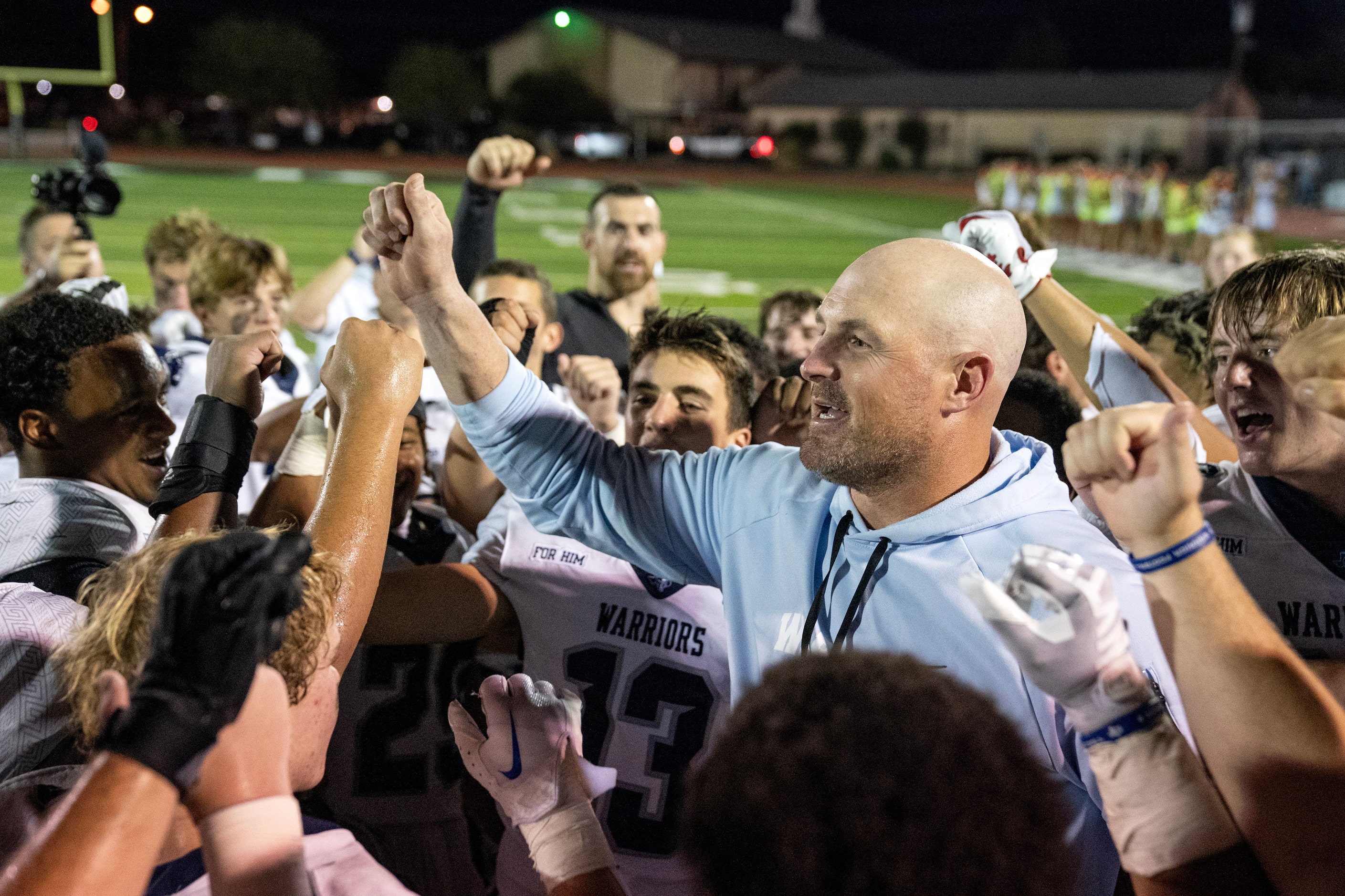 Former Dallas Cowboys great and Argyle Liberty Christian head coach Jason Witten celebrates...