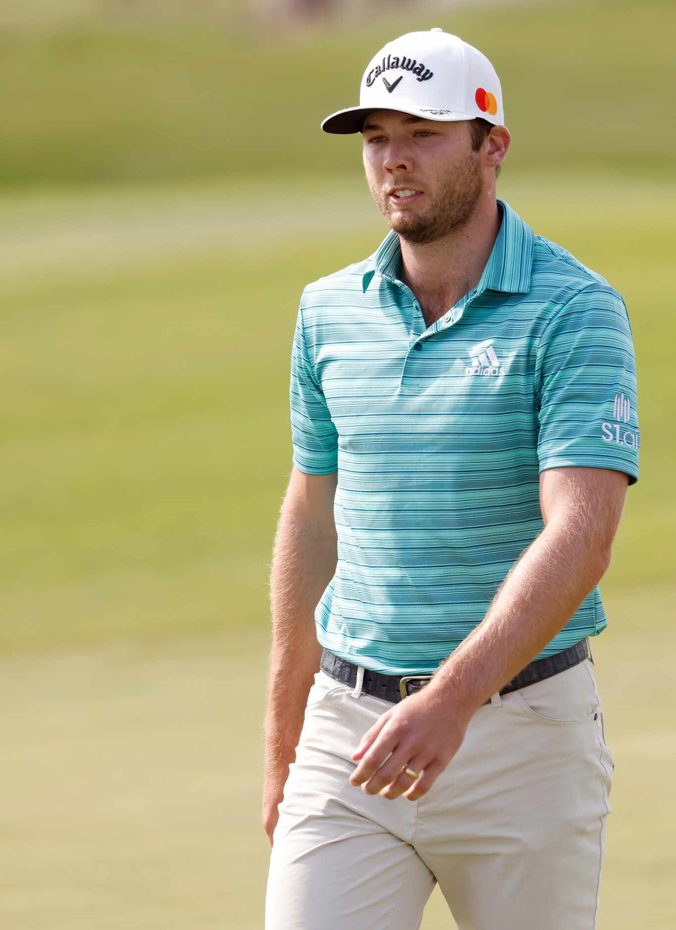 Sam Burns exits the 16th hole green during round 2 of the AT&T Byron Nelson  at TPC Craig...