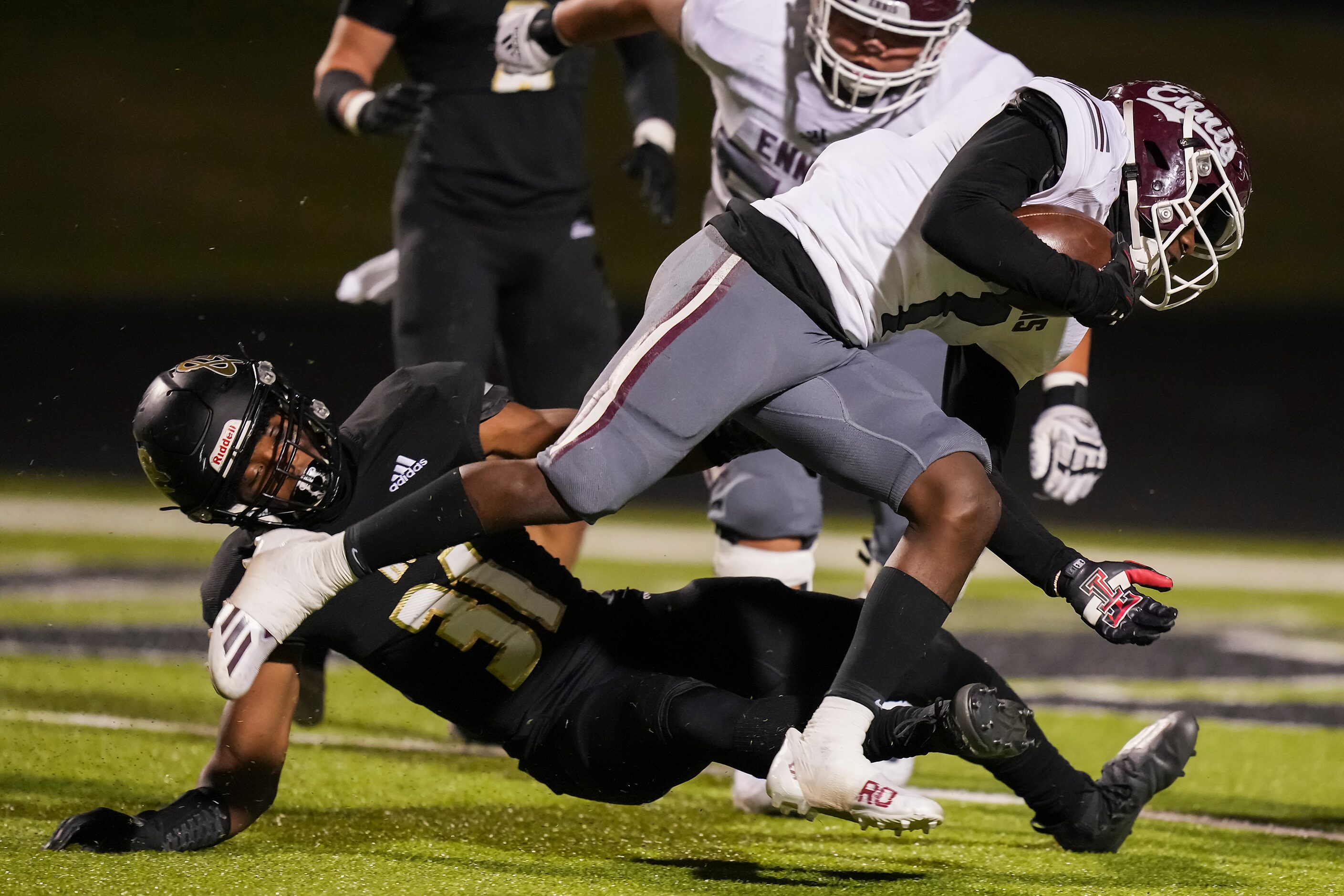 Ennis running back Devion Beasley (1) scores on a 6-yard touchdown run past Royse City...