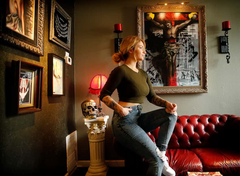 Tattoo artist Deanna James sits at Third Eye Gallery in the Design District of Dallas on...