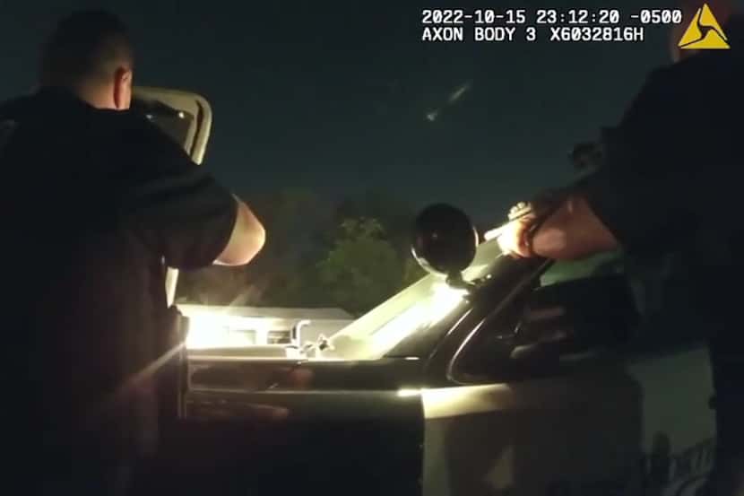 Body-camera footage shows officers responding to the scene of a 911 call late Saturday in...