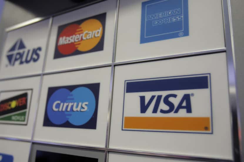 Some consumers may resolve to use their credit cards less, but they apparently are in the...
