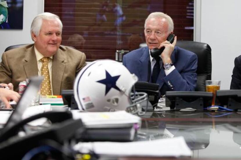 Dallas Cowboys coach Wade Phillips, owner Jerry Jones and team president Stephen Jones in...