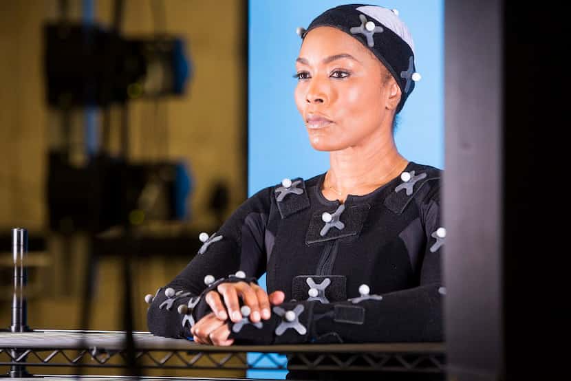This undated photo provided by Ubisoft shows actress Angela Bassett during a motion capture...