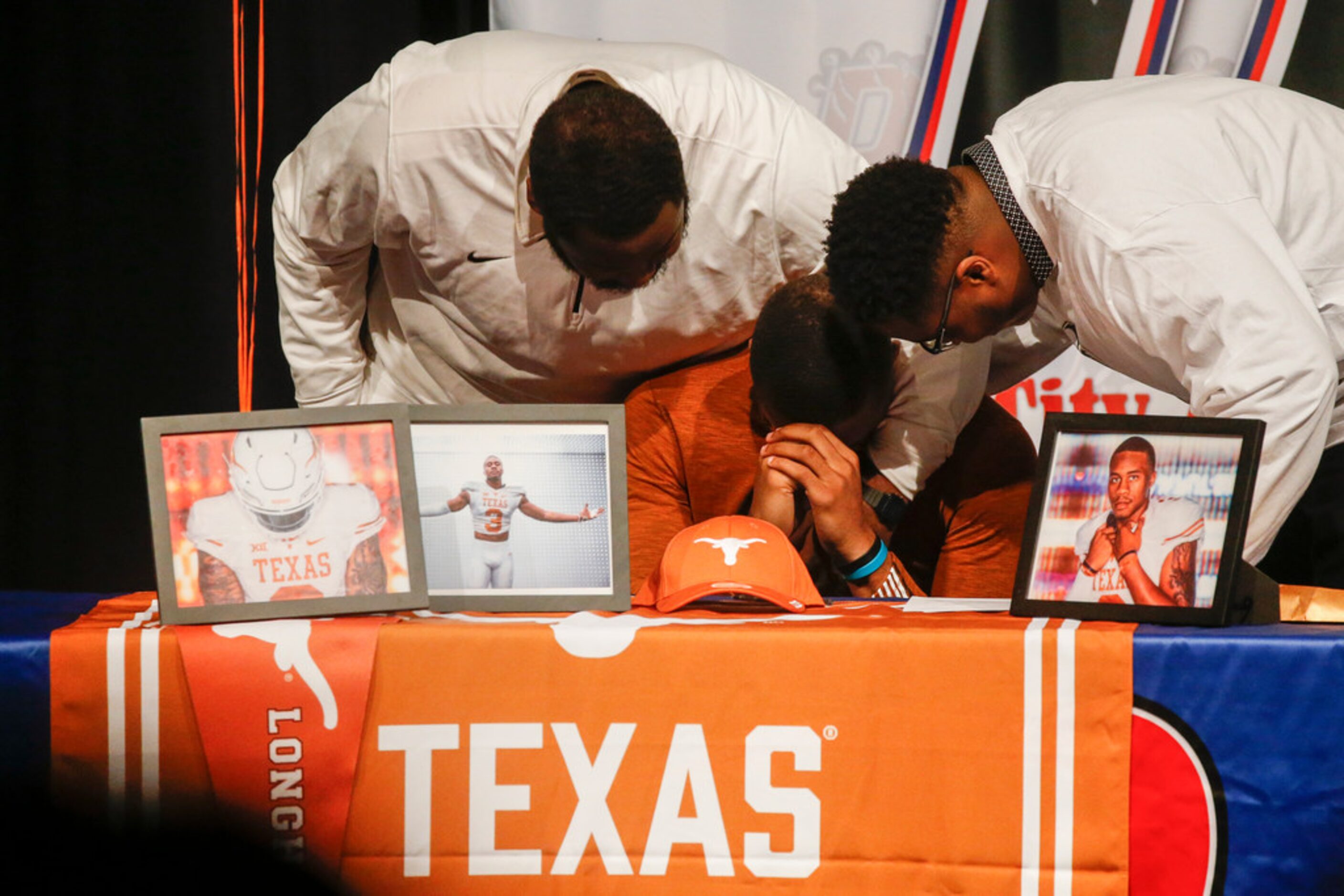 Star Duncanville quarterback Ja'Quinden Jackson reacts as head football coach Reginald...