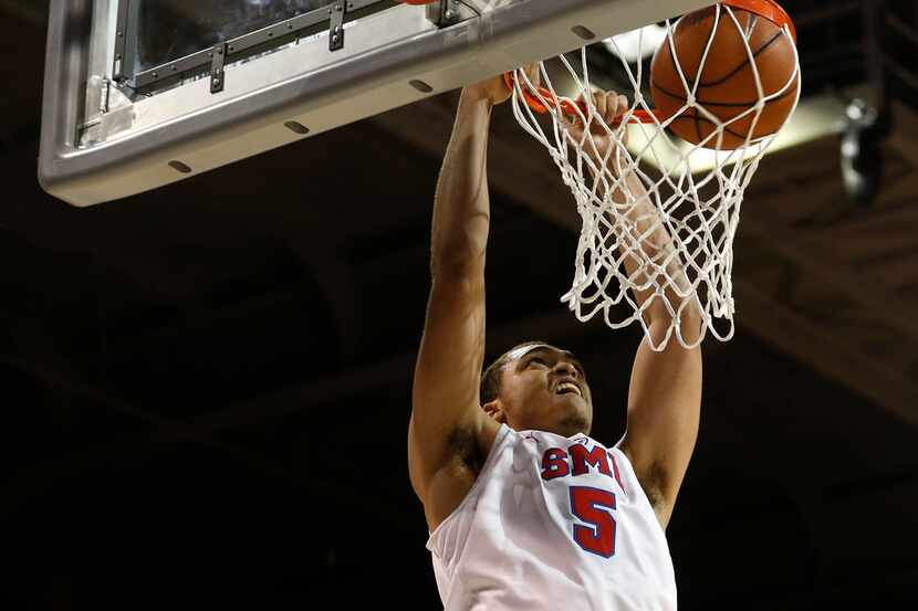 Southern Methodist Mustangs forward Ethan Chargois (5) dunks the ball against the Louisiana...