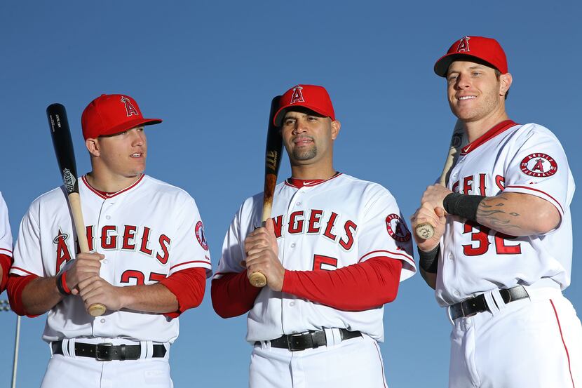 Feb. 21, 2113; Tempe, AZ, USA: Los Angeles Angels outfielder Mike Trout (left), first...