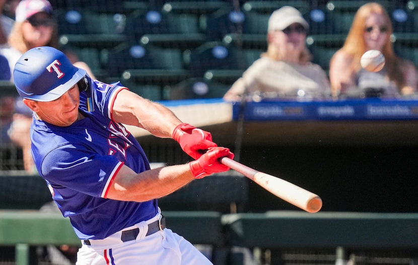 Texas Rangers outfielder Wyatt Langford hits a two-run home run during the third inning of a...