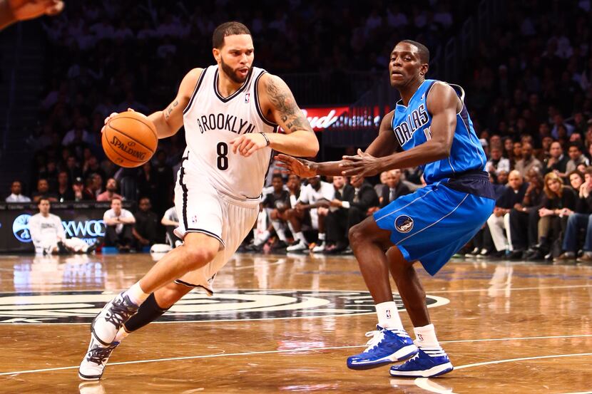 Mar. 1, 2013; Brooklyn, NY, USA; Brooklyn Nets point guard Deron Williams (8) drives to the...