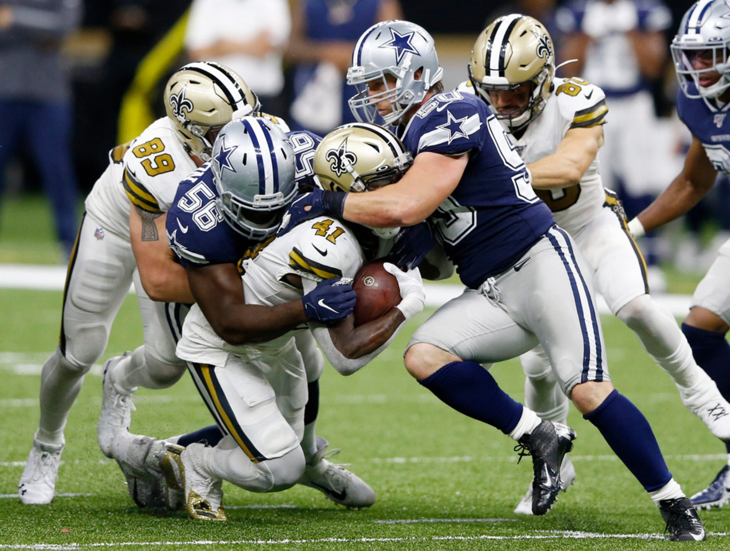 Dallas Cowboys defensive end Joe Jackson (56) and Dallas Cowboys outside linebacker Sean Lee...