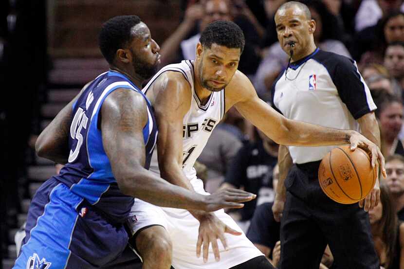 Dallas Mavericks center DeJuan Blair (45) posted up against San Antonio Spurs forward Tim...
