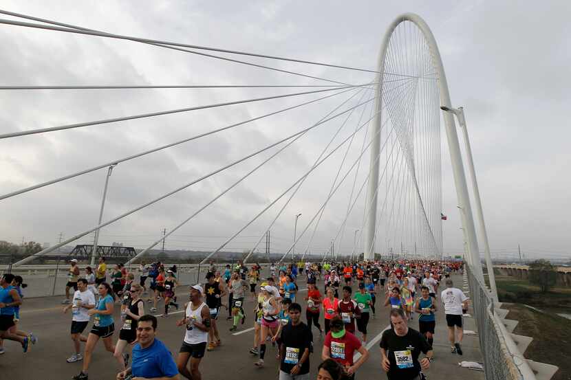 Runners headed east across the Margaret Hunt Hill Bridge during the MetroPCS Dallas Marathon...