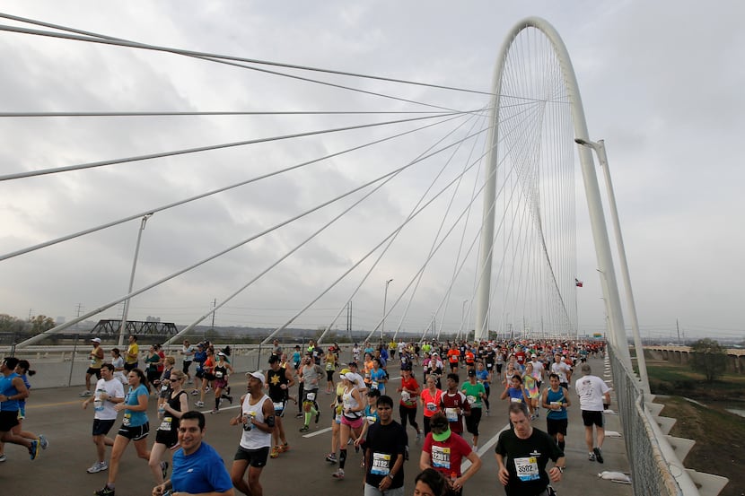 Runners headed east across the Margaret Hunt Hill Bridge during the MetroPCS Dallas Marathon...