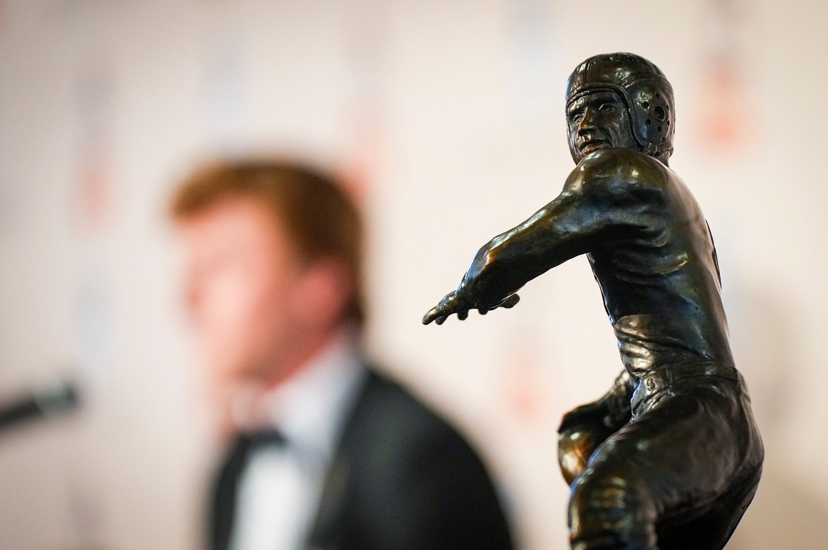 TCU quarterback Max Duggan speaks to reporters behind the Davey O'Brien Award, given to...