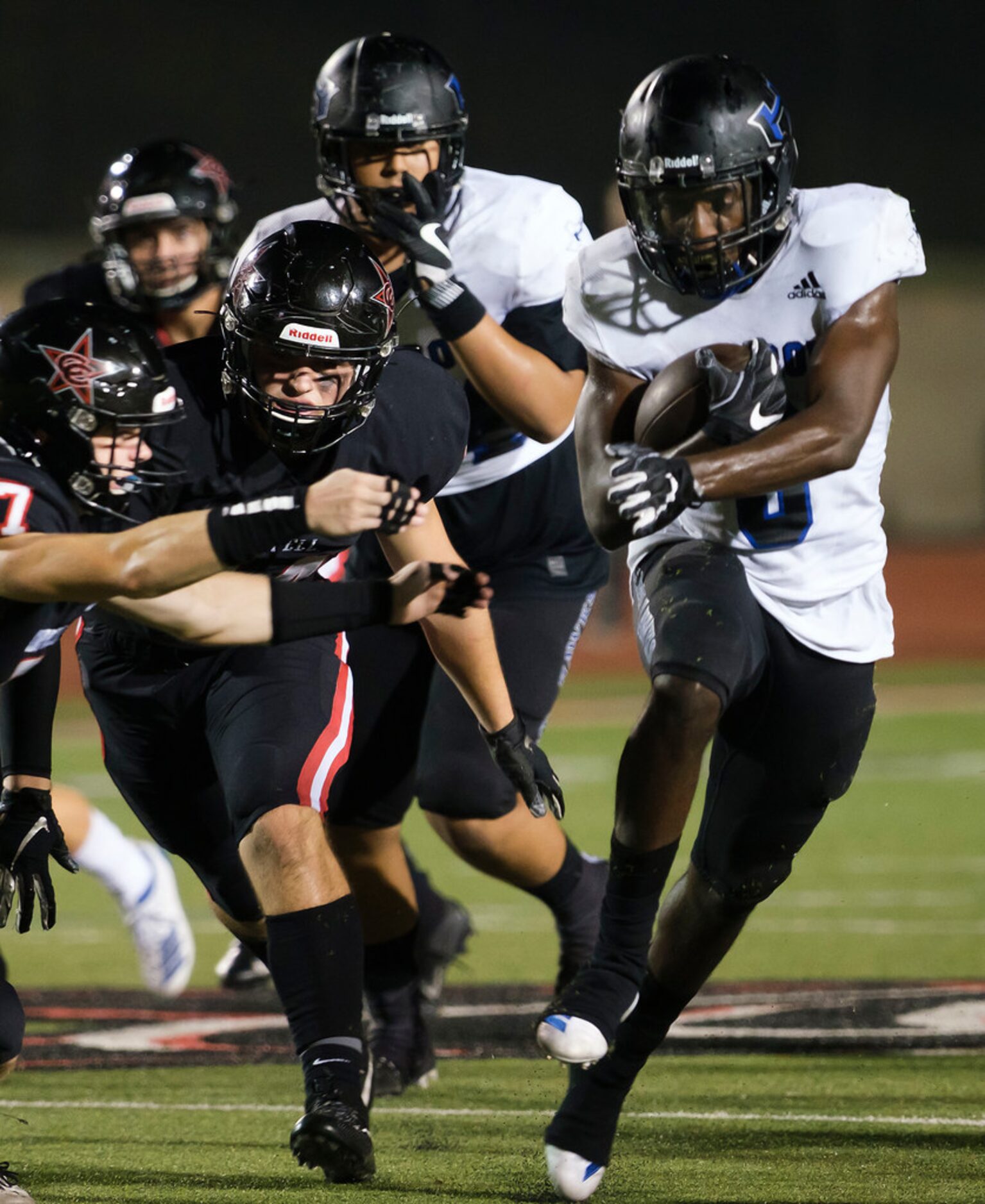 Hebron running back Jaylon Lott (6) breaks through the Coppell defense during the second...