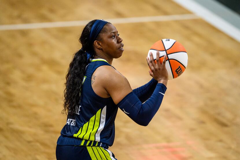 Dallas Wings guard Arike Ogunbowale (24) shoots during a WNBA basketball game against the...