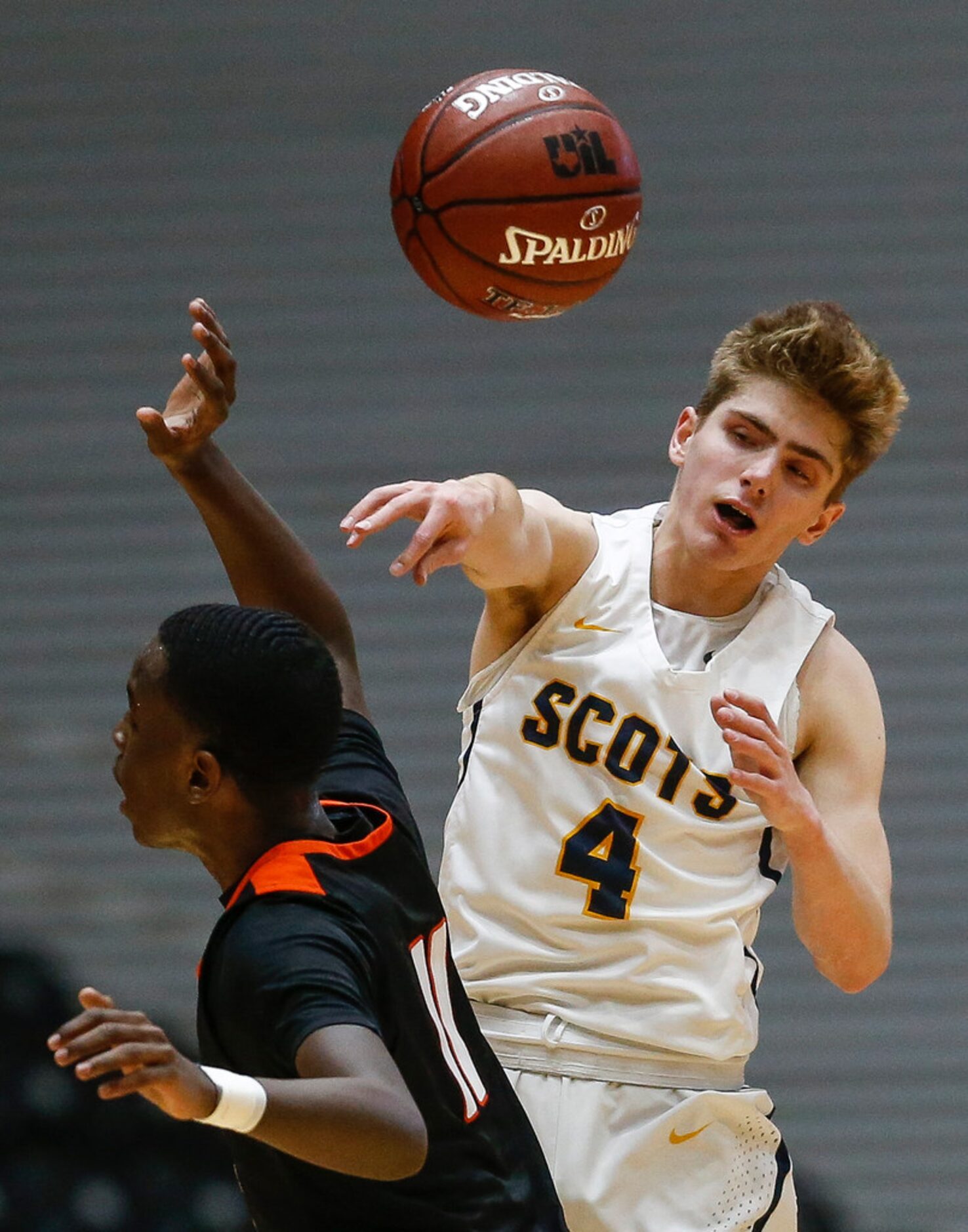 Highland Park's Jack Pease (4) fires off a pass over Lancaster's Jalen Williams (11) during...