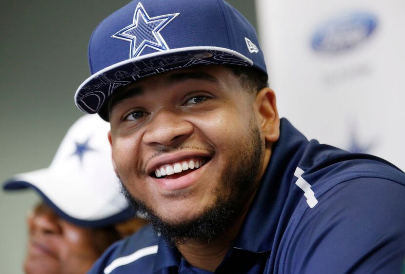 Former LSU offensive lineman La'el Collins speaks to the media during a press conference to...