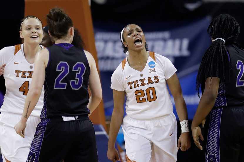 Texas guard Brianna Taylor (20) reacts after she scored against Central Arkansas during a...