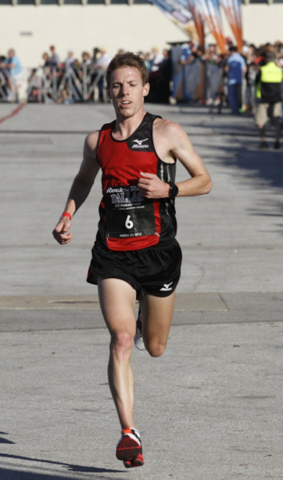 Craig Leon runs in the Dallas Rock 'N' Roll half marathon on Sunday, March 25, 2012.