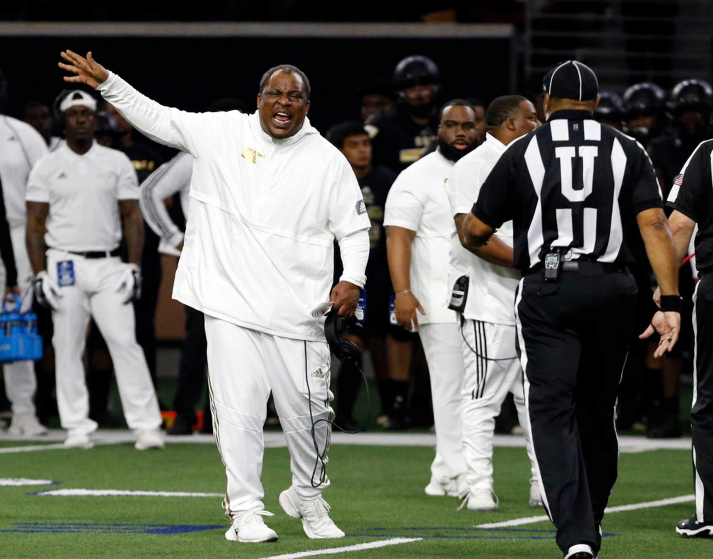 South Oak Cliff coach Jason Todd complains to game officials during the first half of the...
