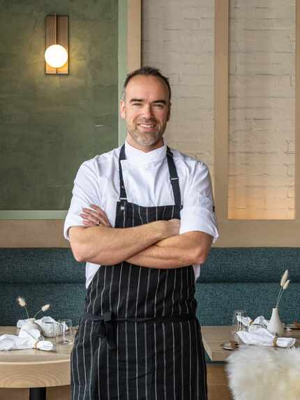 Chef standing in his restaurant